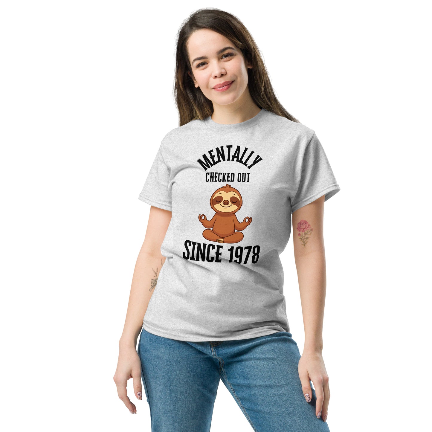 Woman wearing a gray t-shirt with a sloth graphic and text on a white background